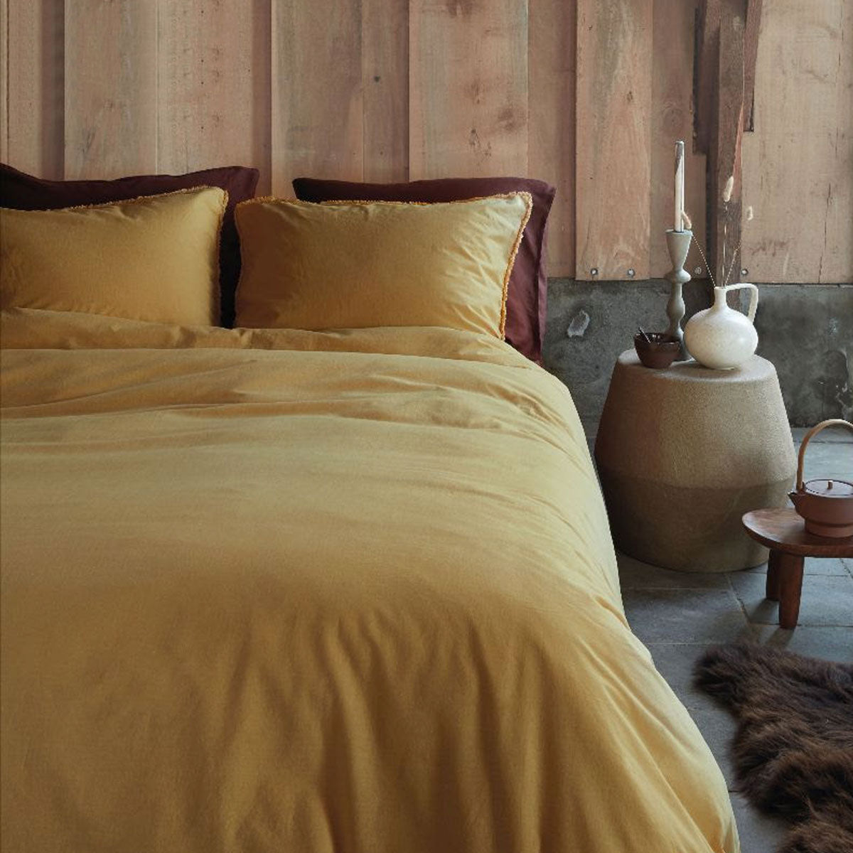 VTWonen Natural Stone Fraying Yellow Quilt Cover Set: "Elegant VTWonen Natural Stone fraying yellow quilt cover set, featuring a soft cotton sateen fabric with a solid colour design, including one quilt cover and two pillowcases."